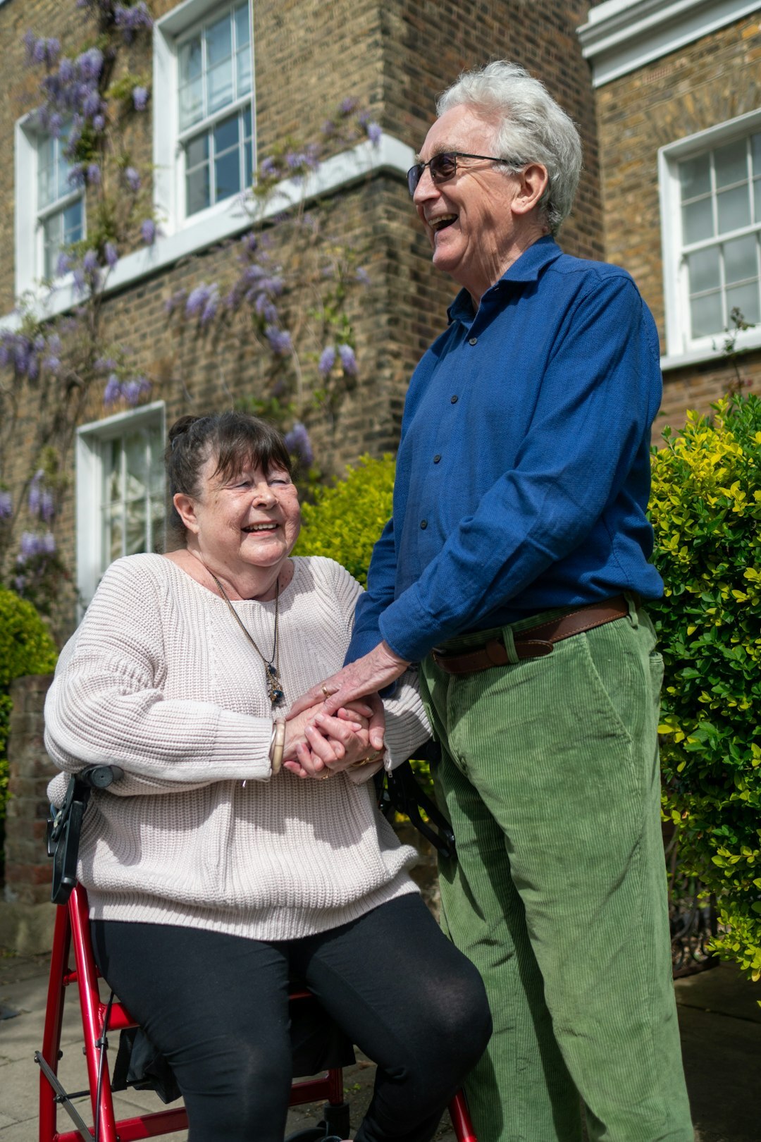 elderly neighbors chatting outside